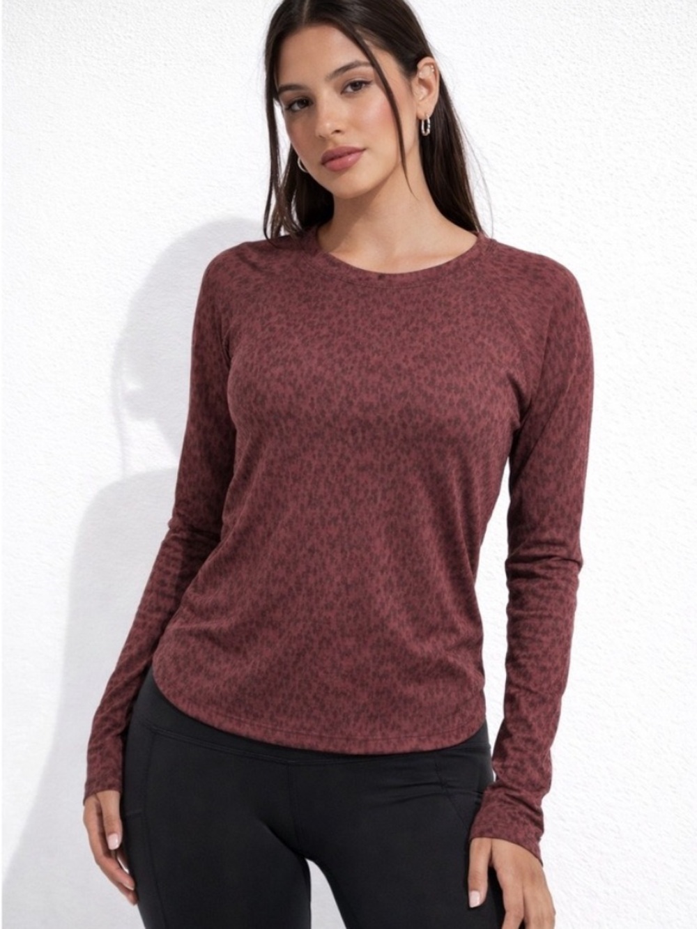 Athleta Momentum Seamless Top in burgundy leopard print